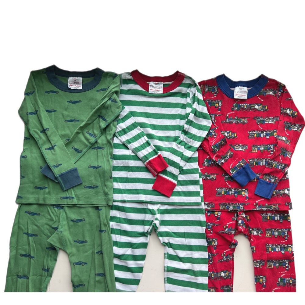3 sets of Hanna Andersson size 100 PJs. Trains, stripes and cars.